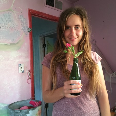 Stephanie picks roses for Shabbat