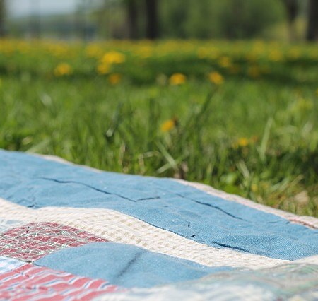 as a single mother’s heart holds her child …even as she sits…and watches him at track meets…even so…